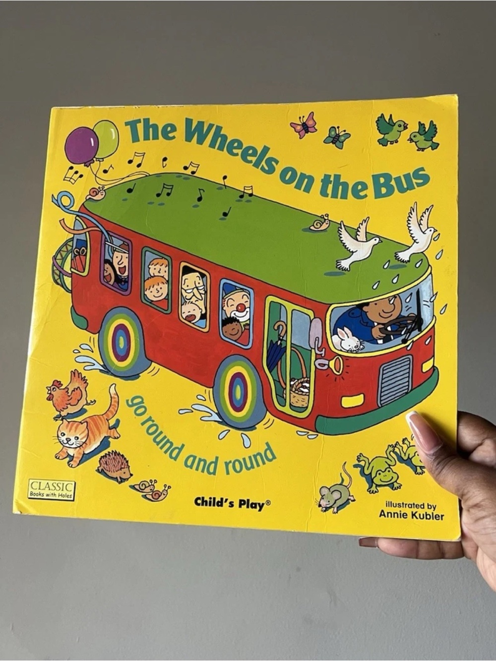 The Wheels on the Bus Go Round and Round book